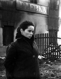 Geraldine Chaplin wearing a black fur coat in a side view photo print.