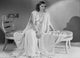 Classic portrait photo print of Barbara Stanwyck in a sleeping dress.