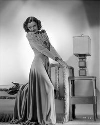 Barbara Stanwyck side view photo print showcasing classic Hollywood glamour.