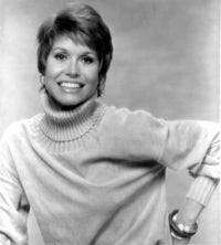 Mary Moore smiling in a white sweater photo print.