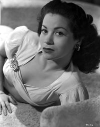 Diosa Costello reclining photo print showcasing elegance and poise.