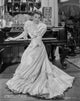 Barbara Stanwyck standing in glossy long dress classic portrait photo print.