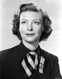 Ann Doran portrait in black blouse and bow tie, classic photo print