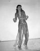 Barbara Stanwyck photo print on stage in long elegant dress.