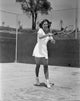 Barbara Stanwyck Playing Tennis in White Dress Photo Print