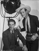 Charles Starrett on set photo print with co-star