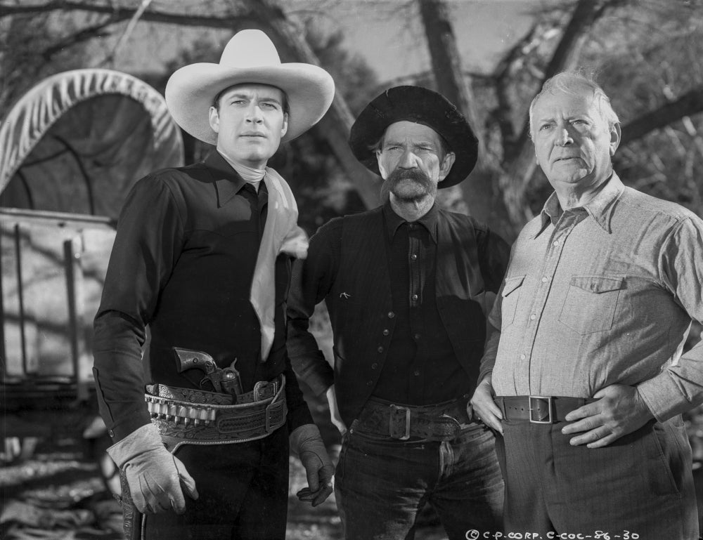 Charles Starrett film still photo print, available in various sizes.