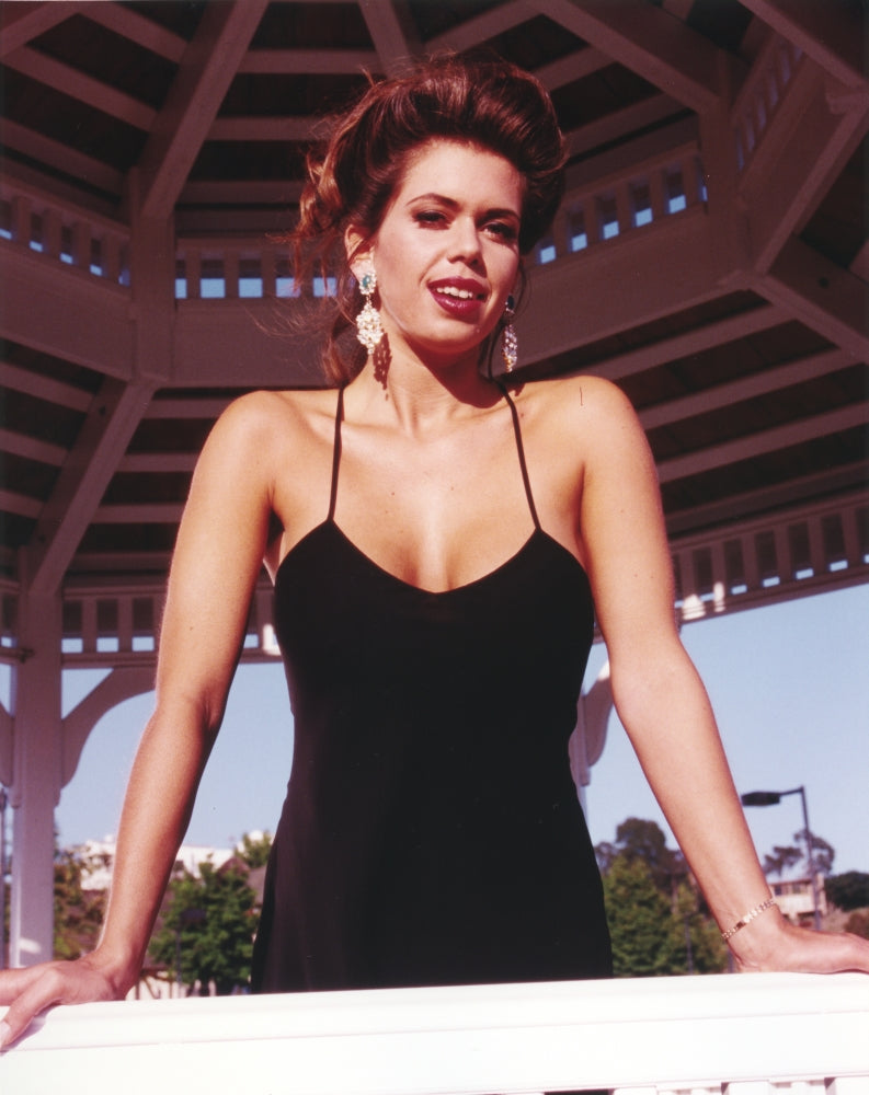 Nici Sterling posed in a sexy black dress photo print