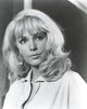 Classic portrait photo print of Stella Stevens in an elegant blouse.