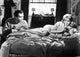 Sue Lyon film still photo print of actress lying on bed.