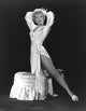 Stella Stevens black and white photo print in white robe