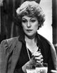 Lynn Redgrave looking away in elegant black dress photo print.