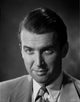 James Stewart close-up portrait photo print in grey velvet suit.