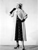 Carla Balenda in Trench Coat with Gloves Photo Print