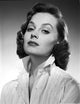 Victoria Shaw in a stylish white ruffled shirt photo print