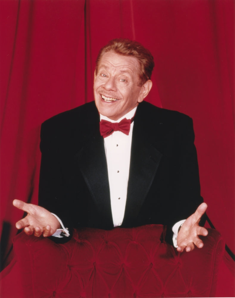 Jerry Stiller photo print in black suit and red bow tie on red background