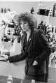 Barbra Streisand leaning on a counter photo print