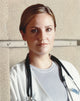 Sherry Stringfield photo print in white coat with stethoscope.