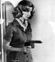 Blythe Danner holding pistol classic photo print.