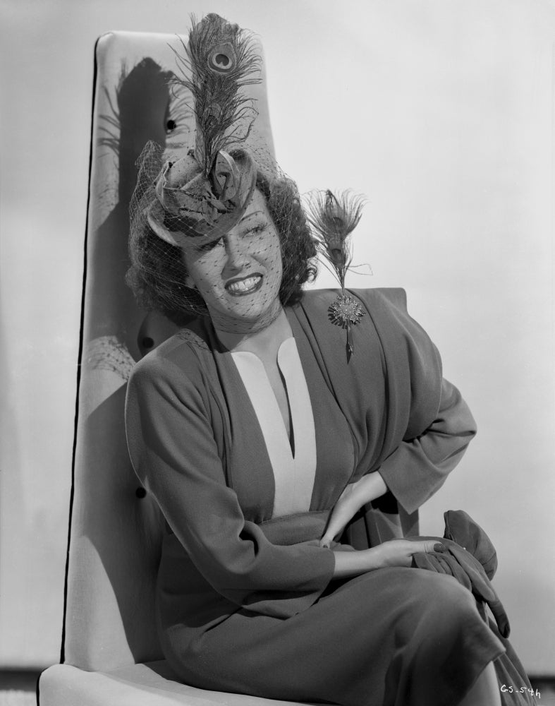 Gloria Swanson smiling in a formal outfit photo print