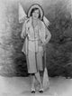 Gloria Swanson posed with an umbrella in a fur coat photo print.