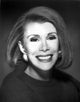 Joan Rivers classic portrait photo print showcasing a big smile with earrings.