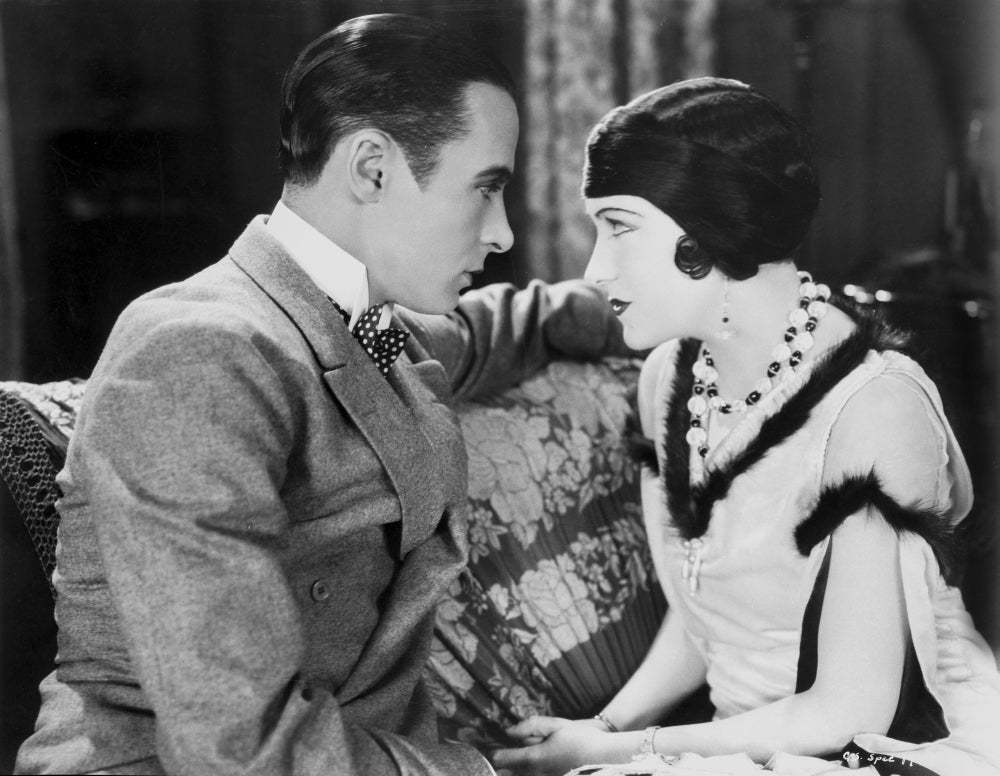 Gloria Swanson photo print featuring a formal outfit stare.