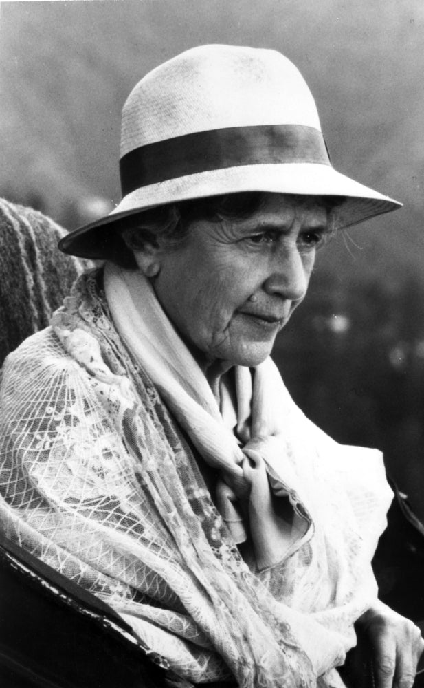 Black and white portrait photo print of Peggy Ashcroft wearing a straw hat