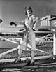 Portrait of Margaret Hayes next to horse paddock photo print