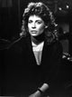 Linda Hamilton classic portrait photo print wearing a black coat.