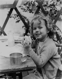 Shirley Temple Eating in Sweater Photo Print