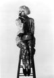 A Portrait of Sandra Bernhard with a Hat Box Photo Print