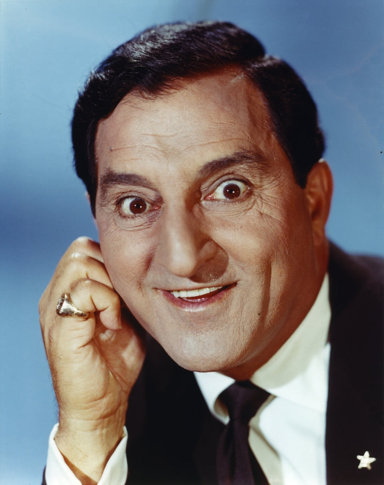 Danny Thomas posed in blue background photo print.