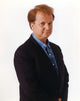Dave Thomas Portrait in Black Coat Photo Print