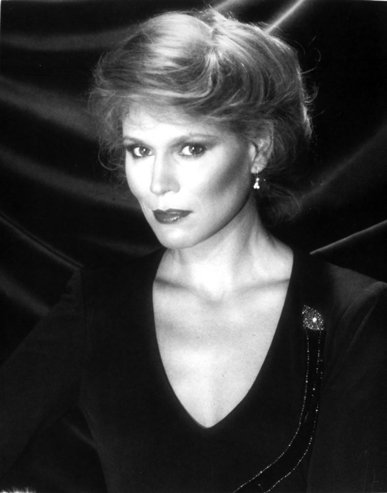 Marthe Keller Portrait Photo Print featuring blouse and earrings.