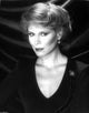Marthe Keller Portrait Photo Print featuring blouse and earrings.
