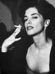 Portrait of Annabella Sciorra Smoking a Cigarette Photo Print