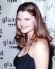 Heather Tom smiling in black dress photo print, available in multiple sizes.