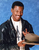 Robert Townsend smiling in a black leather jacket photo print