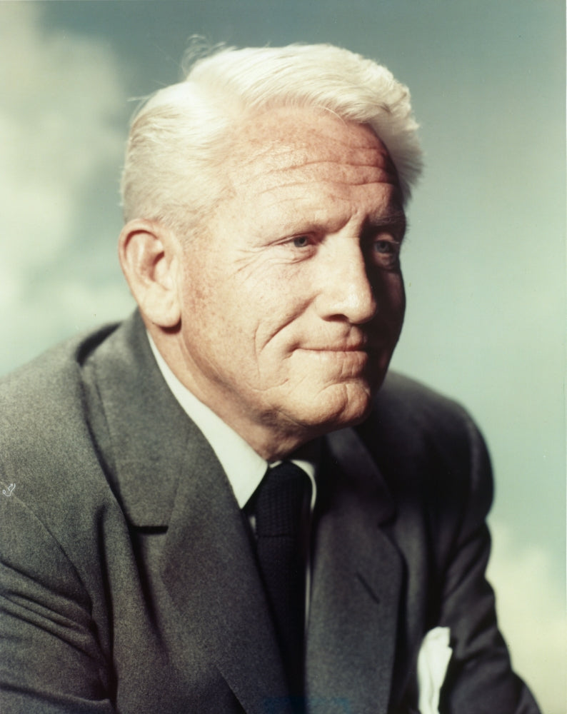 Spencer Tracy photo print in black coat and tie, classic Hollywood style.
