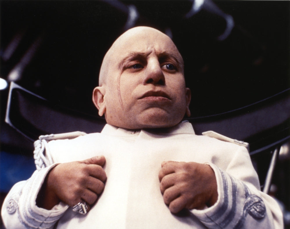 Verne Troyer posed in a white jacket - Photo Print