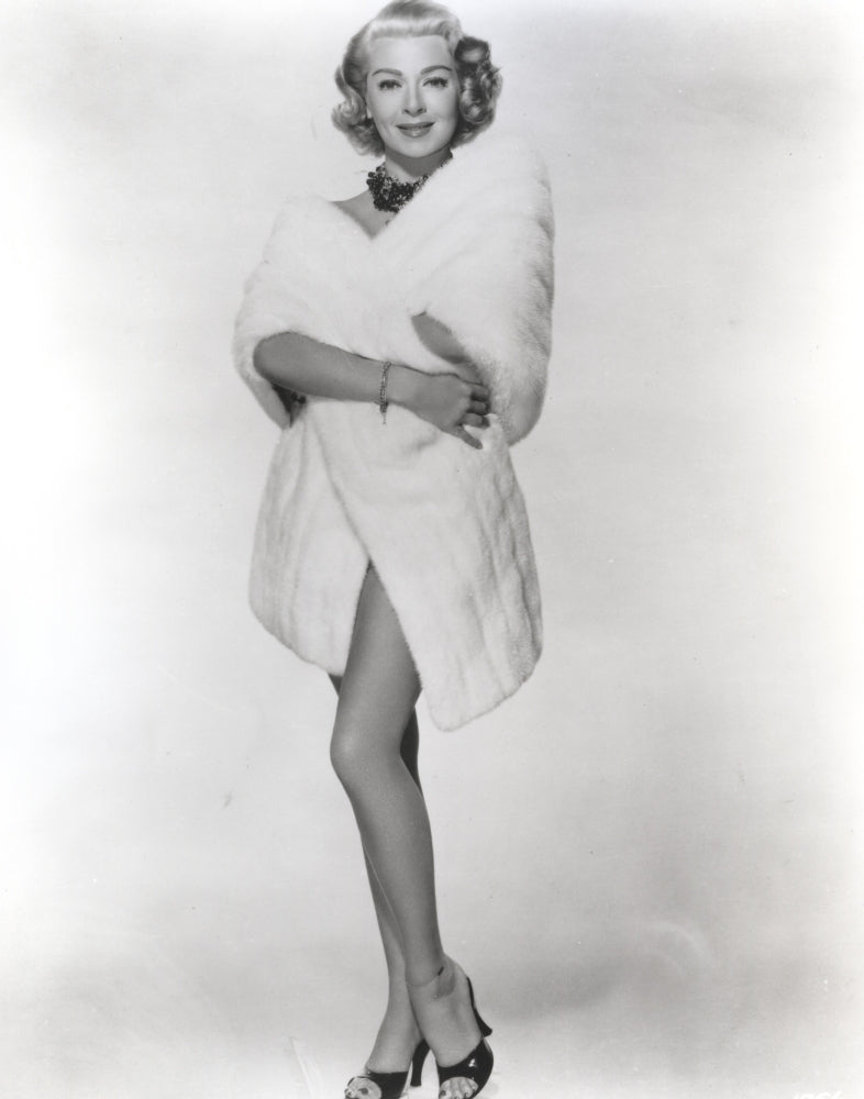 Lana Turner standing in a bathrobe outfit photo print.