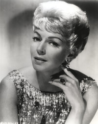 Portrait photo print of Lana Turner wearing a shiny outfit