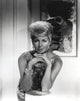 Black and white portrait of Lana Turner in a sparkling dress.