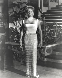 Lana Turner posing in a white long gown photo print