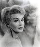 Close up portrait photo print of Lana Turner in side view.