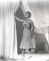 Lana Turner portrait photo print in elegant dress and stiletto heels.