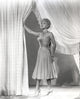 Lana Turner portrait photo print in elegant dress and stiletto heels.