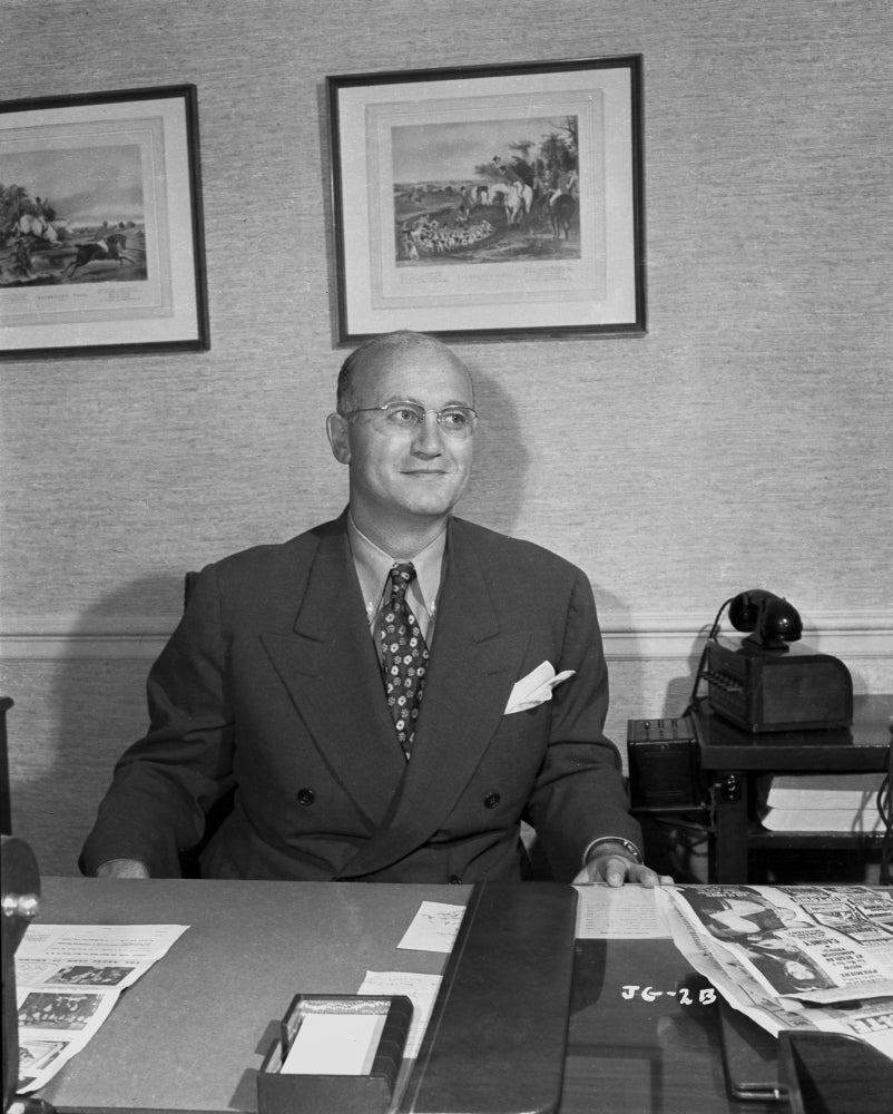 A Portrait of a Man with Glasses Photo Print showcasing character and depth.