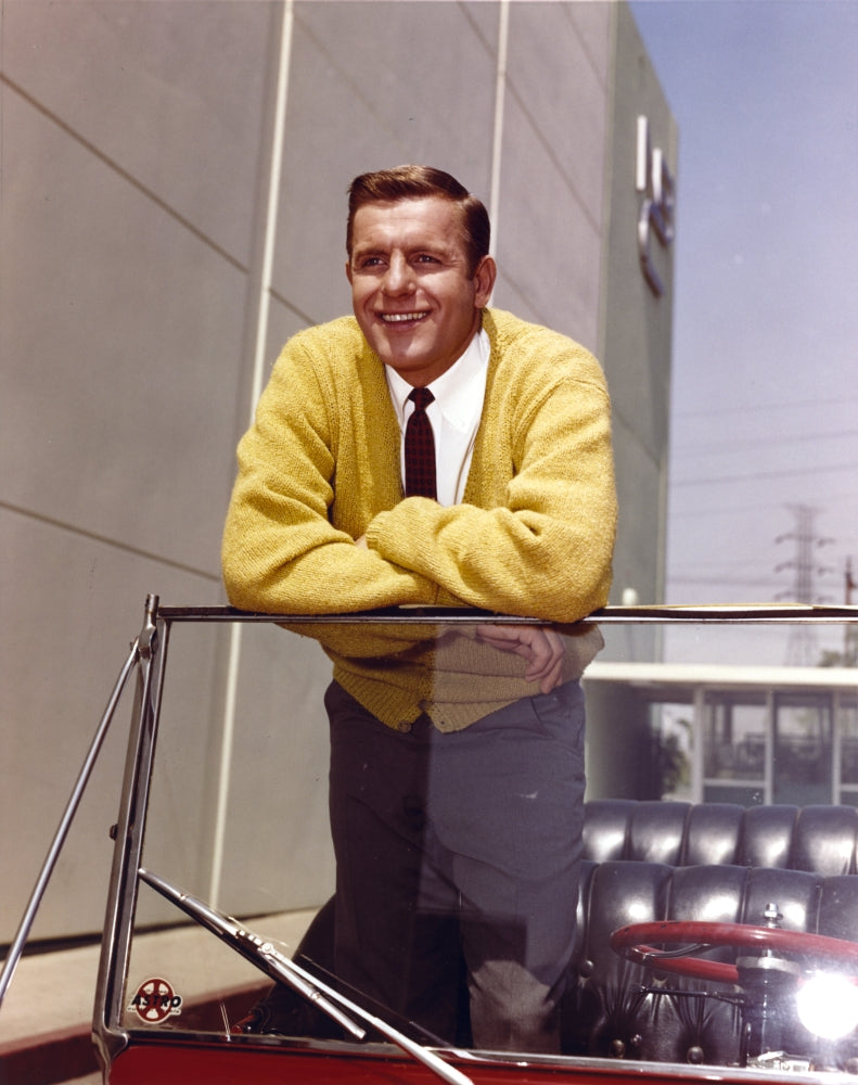 Jerry Van Dyke leaning in yellow coat photo print